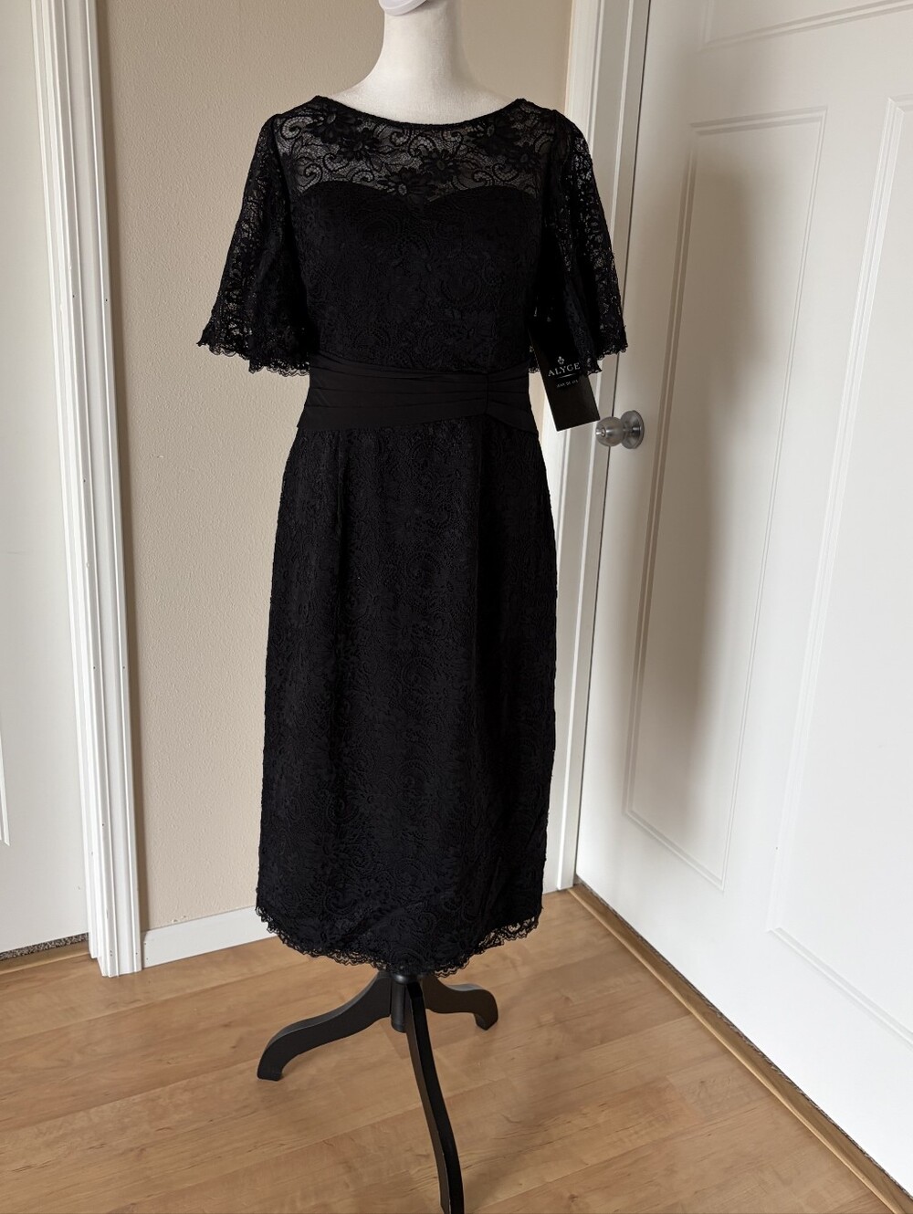 Size 6 black lave flutter sleeve sheat midi w/ waistband and scalloped edges Aly
